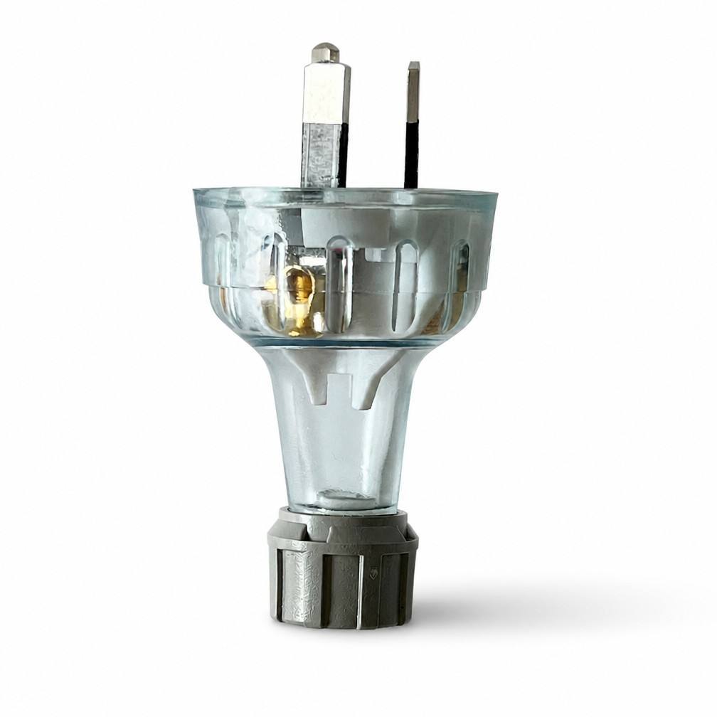 Transparent rewireable three-pin plug with grey cable entry nut, upright view — supplier reference photo showing the 10A version